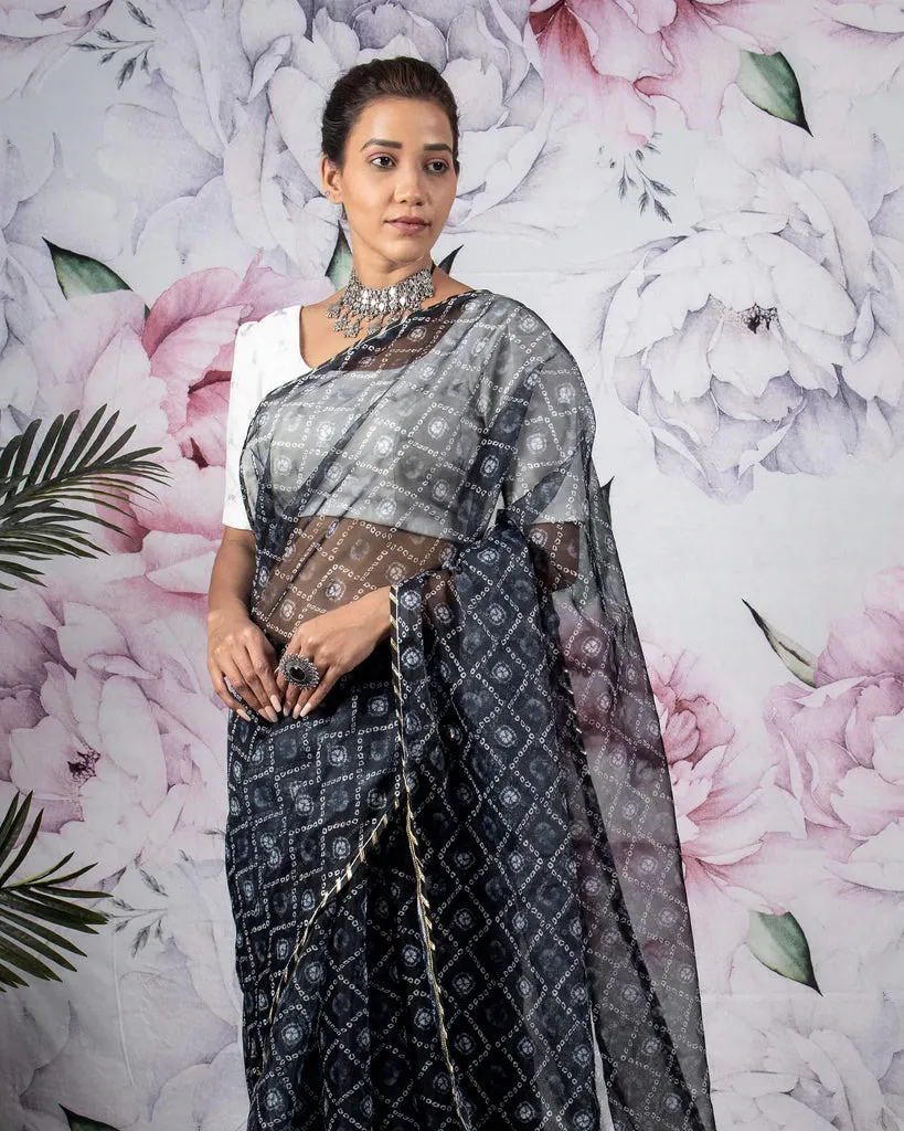 Black And White Bandhani Pattern Organza Saree With Zari Border