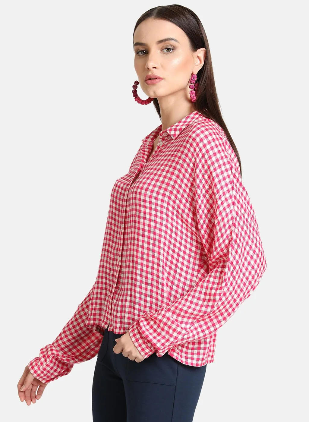 Checked button-down shirt.