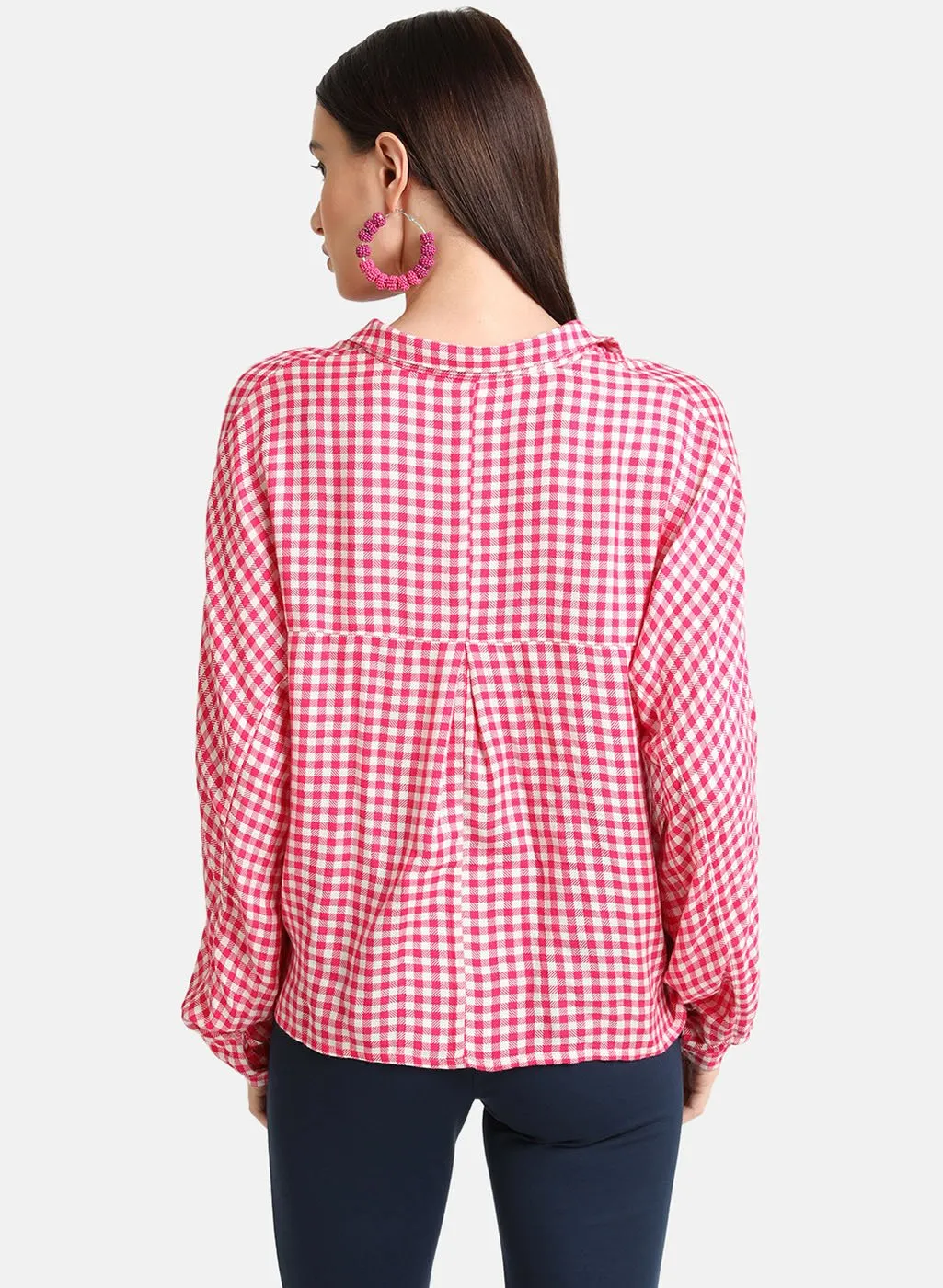 Checked button-down shirt.