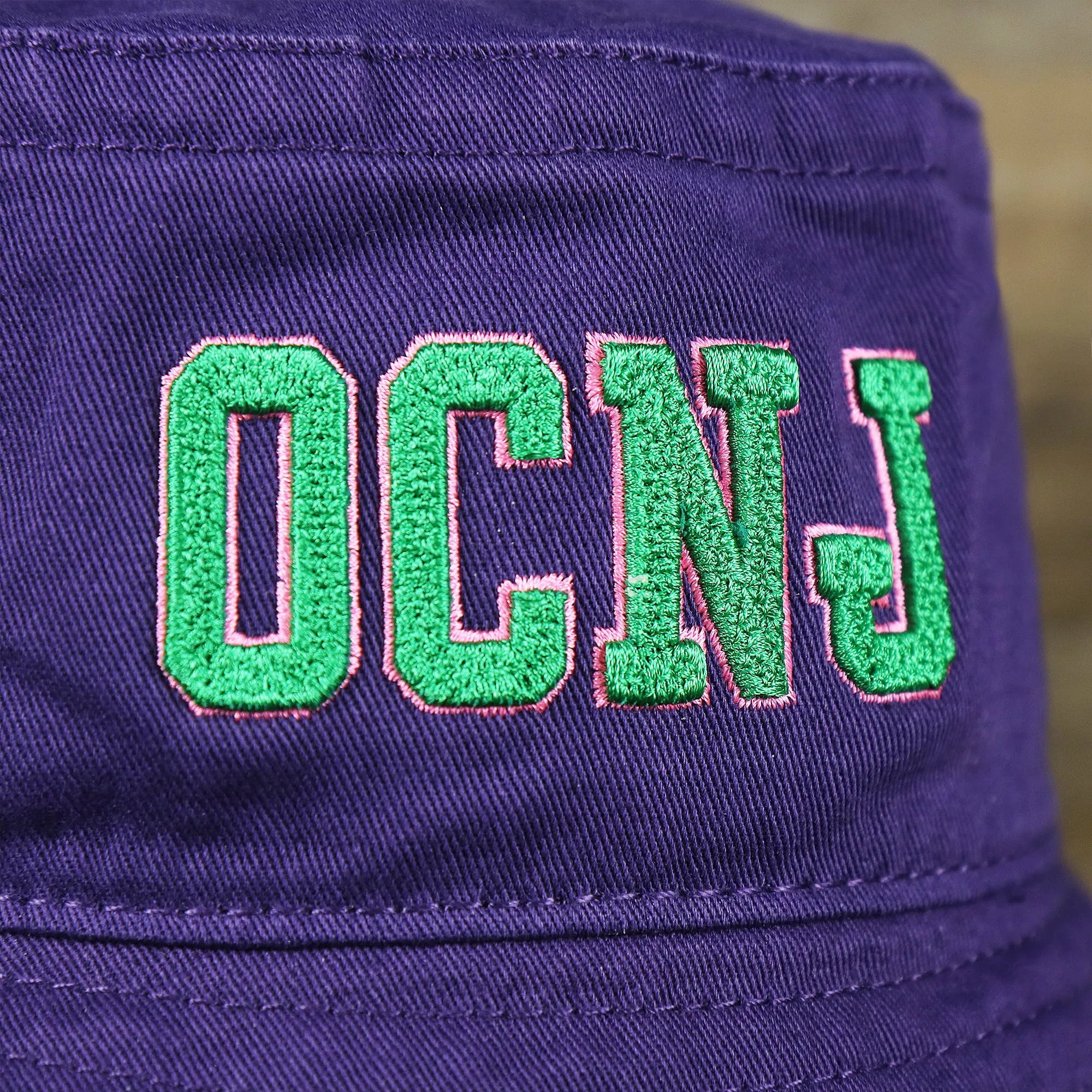 Green OCNJ Double Wordmark Pink Outline Bucket Hat Purple - Buy Now