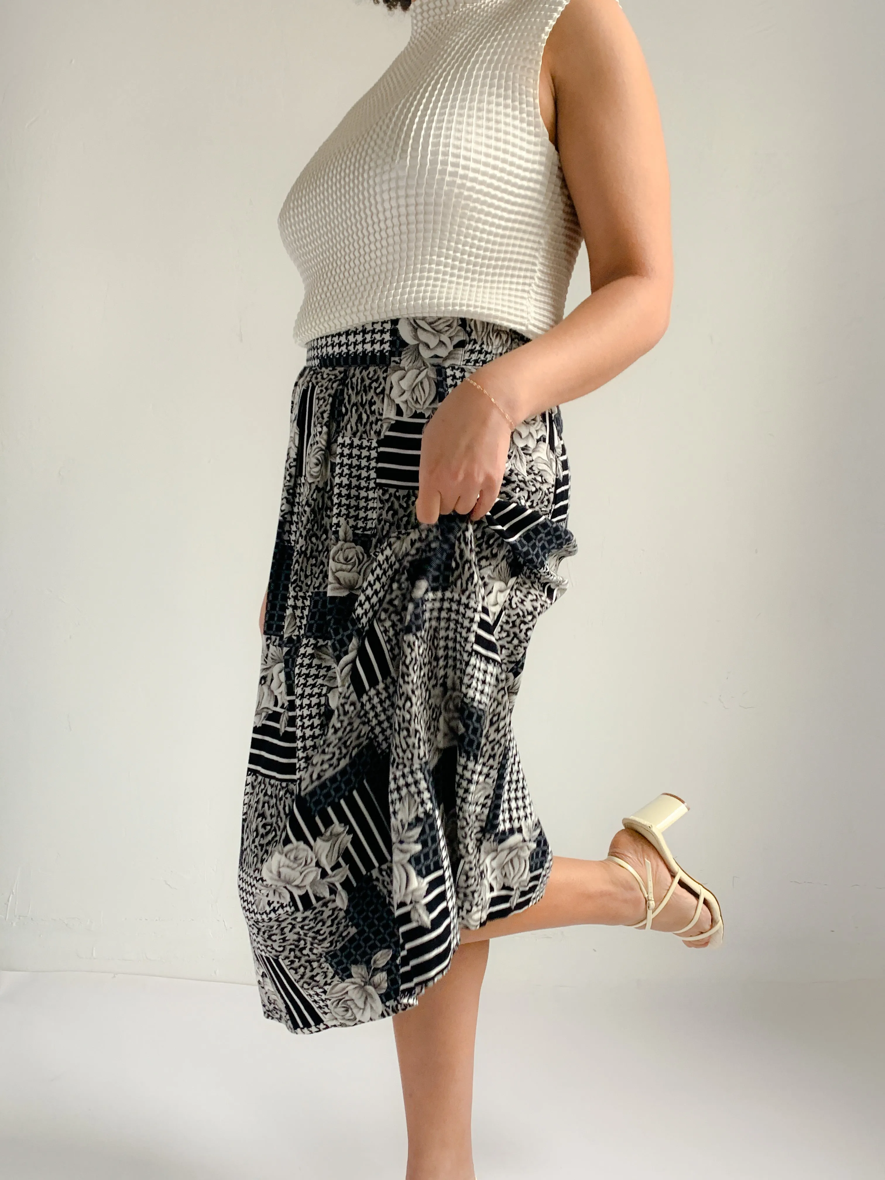 Panther black and white mixed print rayon midi skirt.