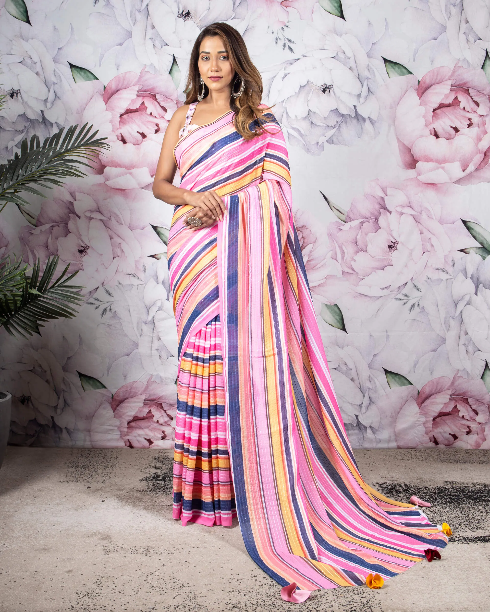 Taffy Pink And Blue Stripes Pattern Sequins Georgette Saree With Tassels