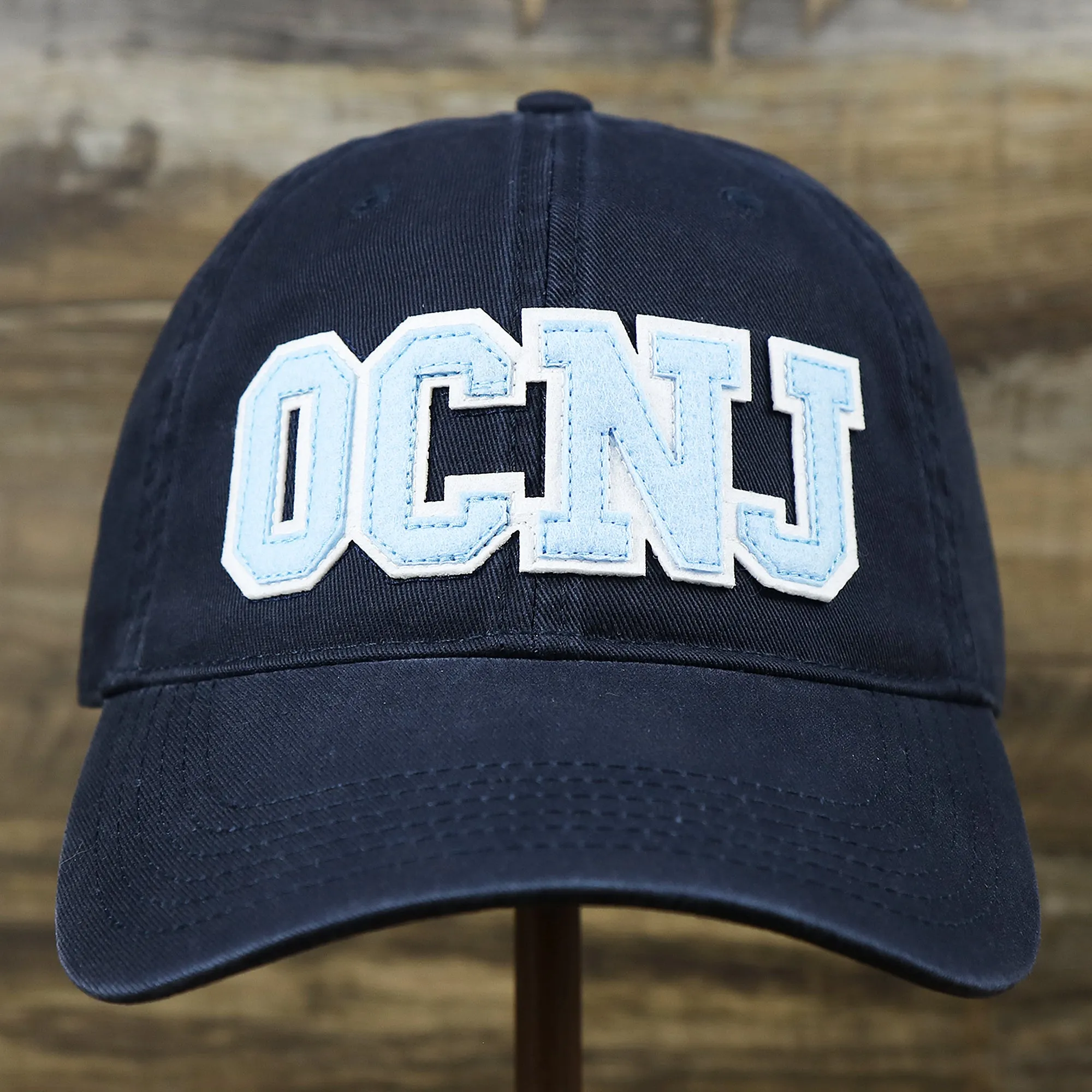 Youth Light Blue OCNJ Wordmark White Outline Baseball Cap